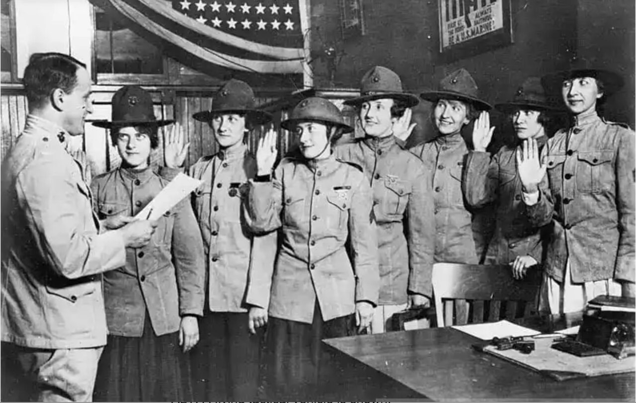 Women take the oath of enlistment.