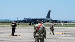 An aircraft taxis on the flightline.