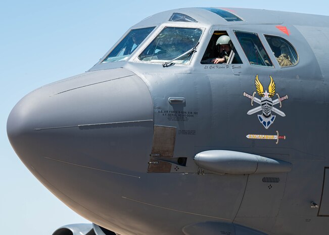 An aircraft sits on the flightline.
