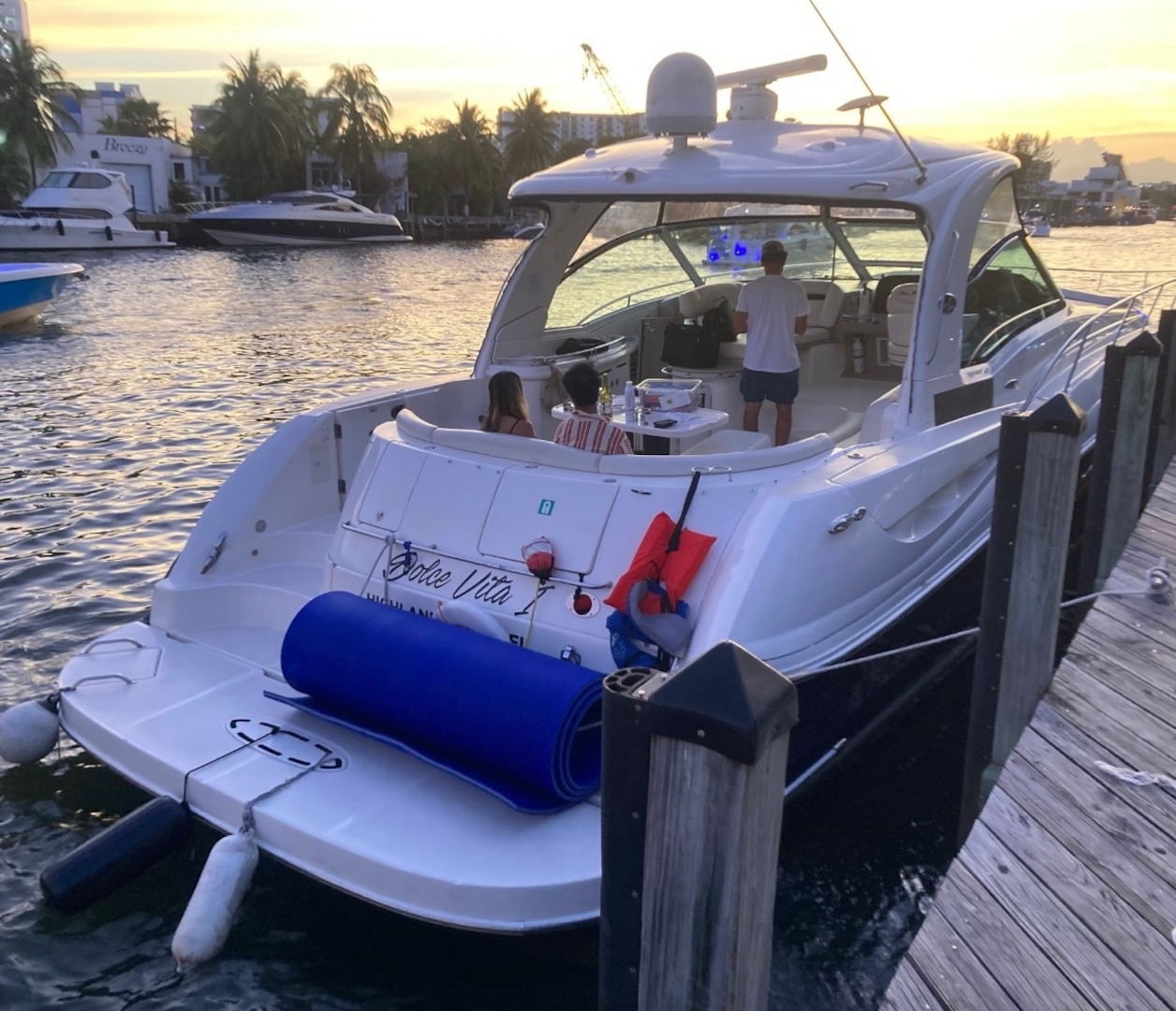 Coast Guard Sector Miami law enforcement officers, along with federal and state law enforcement partners, conduct a boarding on a 50-foot motor yacht, Dolce Vita I, in the vicinity of Lummus Park, Florida, May 18, 2025. The owner of Dolce Vita I was reportedly operating as an illegal uninspected passenger vessel in violation of an active Captain of the Port order issued February 6, 2025, for failing to provide the charterer with a choice of crew. (U.S. Coast Guard photo)