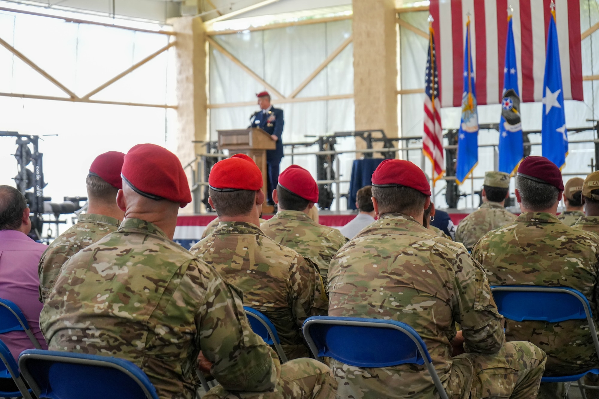 U.S. Air Force Col. Daniel Magruder, Jr., outgoing commander of the 24th Special Operations Wing speaks at the 24 SOW flag furling ceremony May 16, 2025, at Hurlburt Field, Fla.