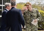 Rear Adm. Lincoln Reifsteck (right), Commander of Submarine Group 7 and Task Forces 54 and 74 based in Yokosuka, Japan, is welcomed to Naval Undersea Warfare Center (NUWC) Division Newport by Eugene Hackney (from left), director of Undersea Warfare at NUWC/Naval Surface Warfare Center Headquarters, and Division Newport Deputy Technical Director Stephen O’Grady on May 2, 2025. Tours and briefings with NUWC Division Newport personnel gave Reifsteck insight into the latest updates to and future warfighting tools at his disposal, while also providing warfare center employees with an understanding of emergent fleet needs.