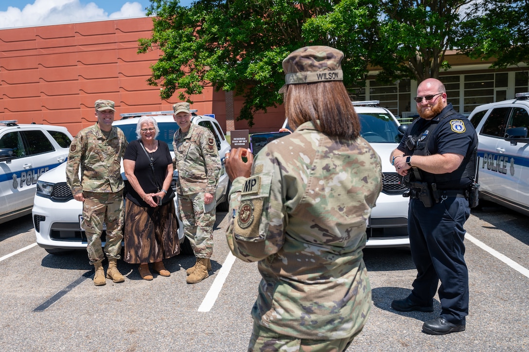 Airman takes a photo of Airmen. (U.S. Air Force photo by Airman 1st Class Skylar Ellis)