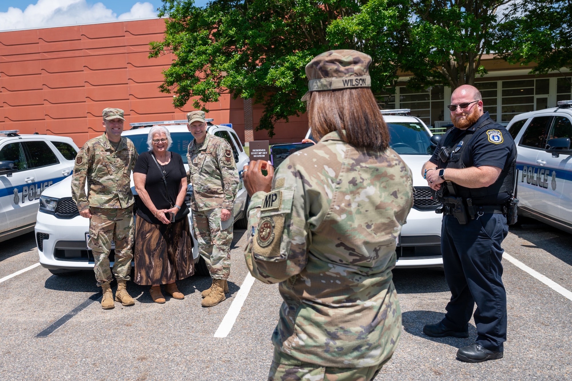 Airman takes a photo of Airmen. (U.S. Air Force photo by Airman 1st Class Skylar Ellis)