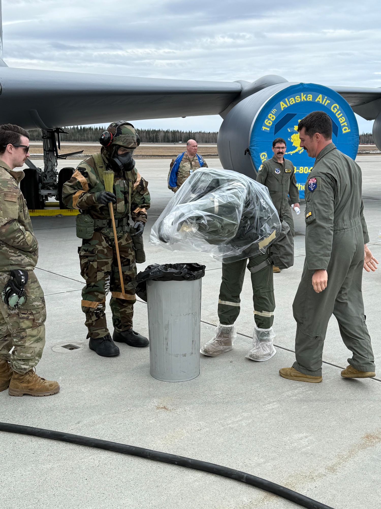 Aircrew members with the 168th Wing Operations Group participate in hands-on CBRN training.