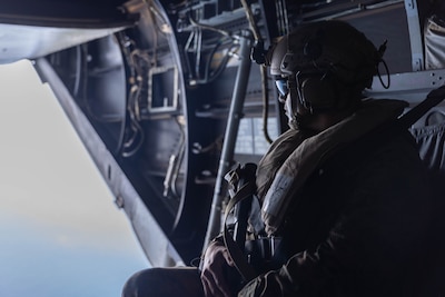 U.S. Marine Corps 1st. Sgt. Ruben J. Duran, the company first sergeant of Echo Company, 2nd Battalion, 1st Marine Regiment, Marine Rotational Force – Darwin 25.3 rides in a U.S. Marine Corps MV-22B Osprey during a Maritime Key Terrain Security Operations event, in support of Exercise Balikatan 25 near Puerto Princesa, Palawan, Philippines, May 5, 2025.