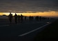 Participants of the Four Chaplain Memorial Run and Ruck trek through the Norwegian Foot March course at Osan Air Base, Republic of Korea, May 17, 2025. The NFM was first held in 1915 to test the physical stamina of soldiers in the Norwegian Army and prepare them for long marches in harsh conditions. (U.S. Air Force photo by Senior Airman Sarah Williams)
