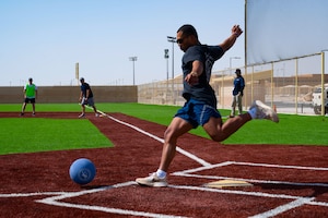 A U.S. Airman kicks during Sports Day within the U.S. Central Command area of responsibility, May 16, 2025. Kickball was one of several events held during the 379th Air Expeditionary Wing Sports Day celebration, in addition to volleyball, pickleball and dodgeball games. (U.S. Air Force Photo by Senior Airman Dieondiere Jefferies)