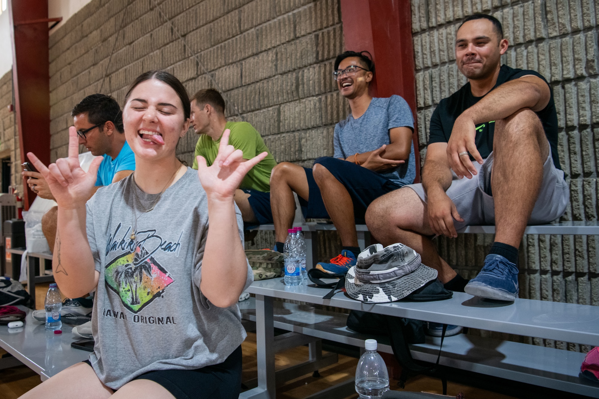 U.S. Airmen celebrates during a volleyball game within the U.S. Central Command area of responsibility, May 16, 2025. Volleyball was one of several events held during the 379th Air Expeditionary Wing Sports Day celebration, in addition to kickball, pickleball and dodgeball games. (U.S. Air Force Photo by Staff Sgt. Sean Moriarty)