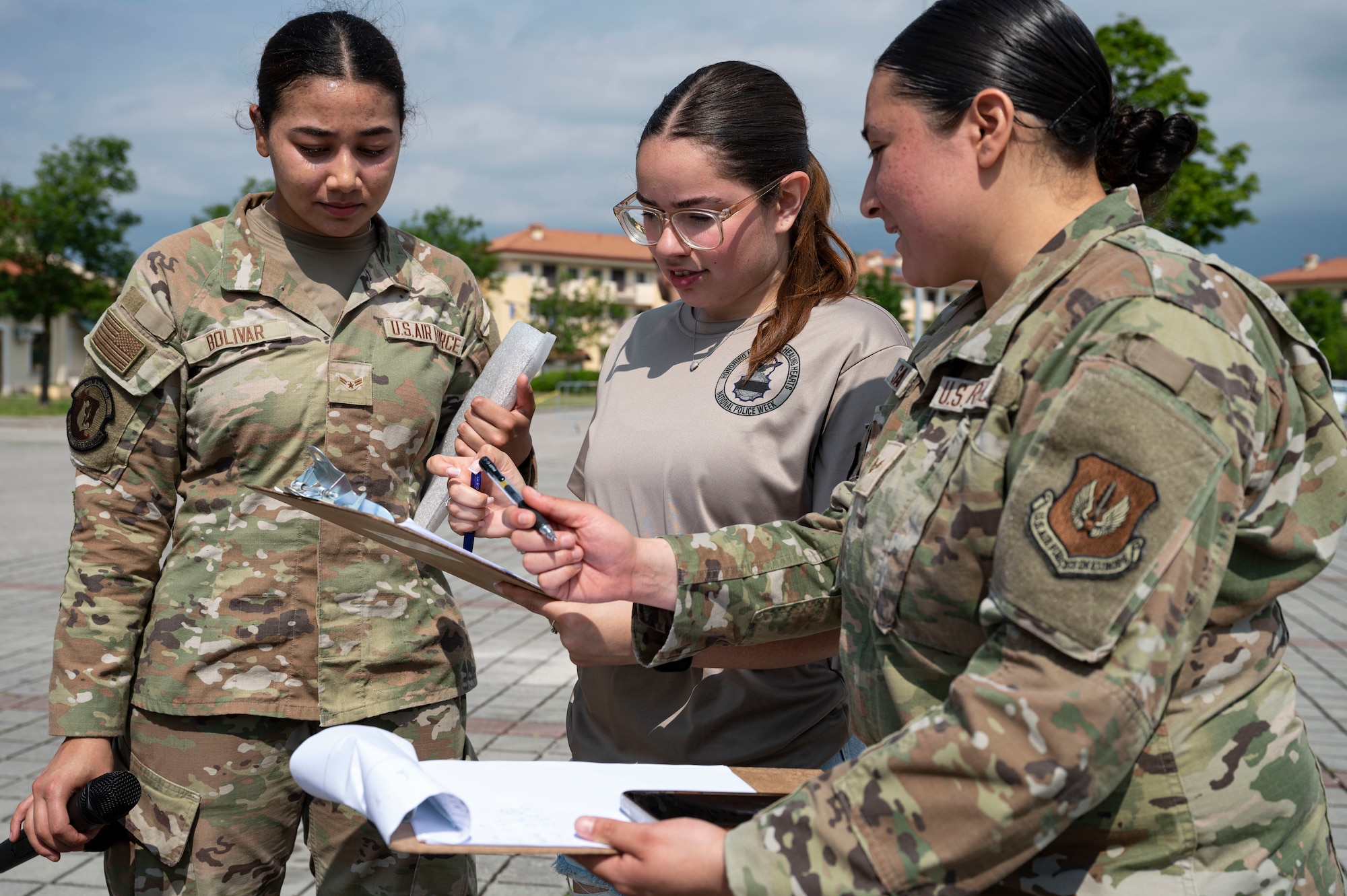 Airmen judging a competition