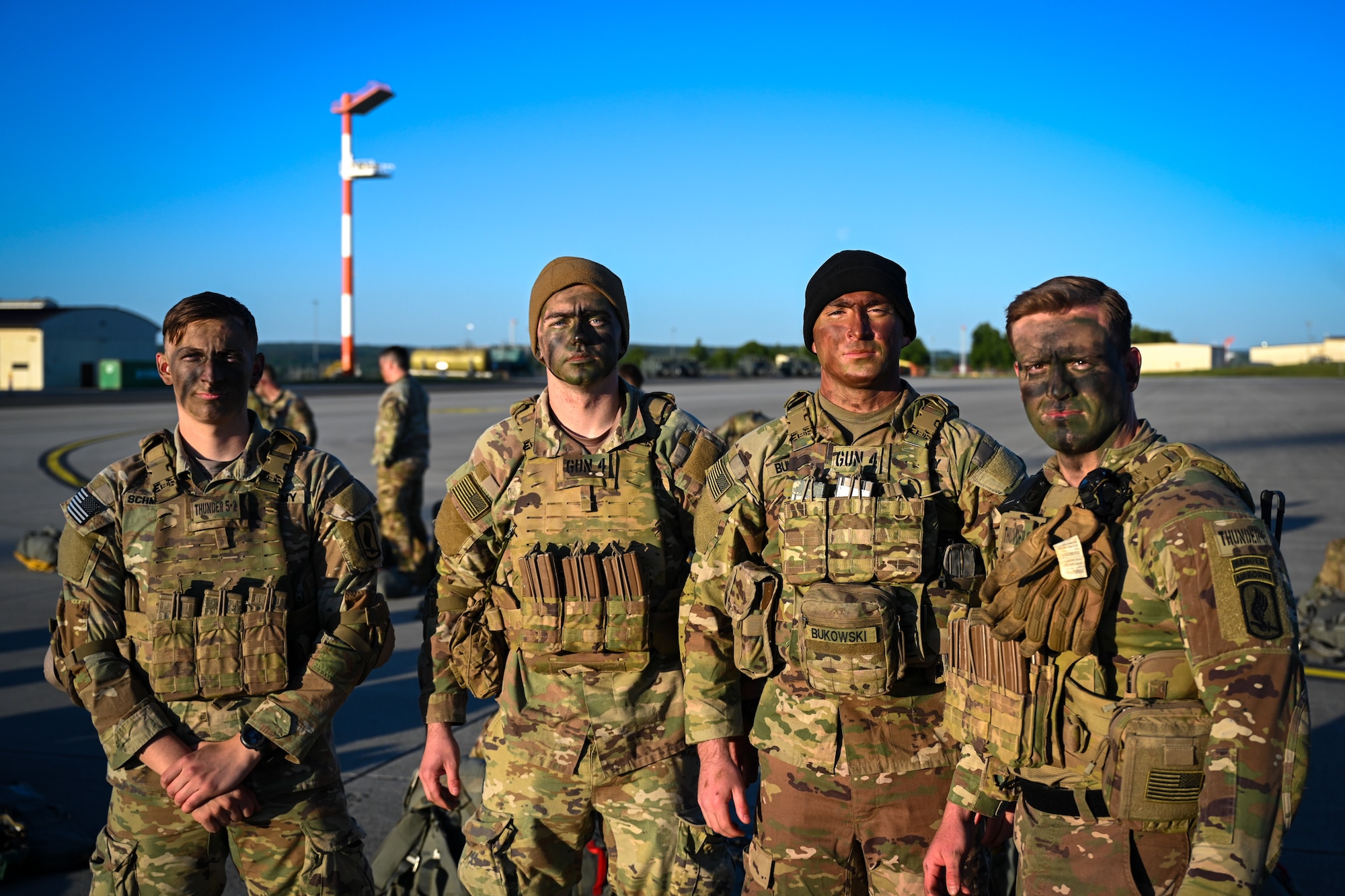 U.S. Army paratroopers assigned to the 2nd Battalion, 503rd Parachute Infantry Regiment, 173rd Airborne Brigade, pose for a photo during Swift Response 25 on the flightline at Spangdahlem Air Base, Germany, May 16, 2025.