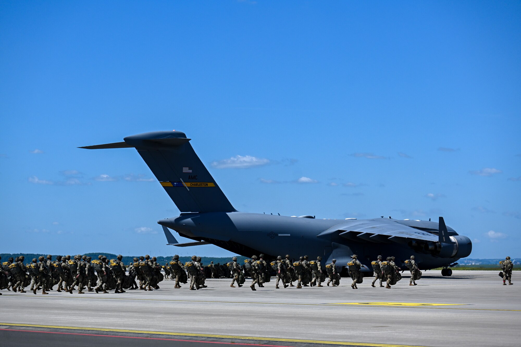 U.S. Army paratroopers from the 173rd Airborne Brigade board C-17 Globemaster III’s during Swift Response 25 on the flightline at Spangdahlem Air Base, Germany, May 16, 2025.
