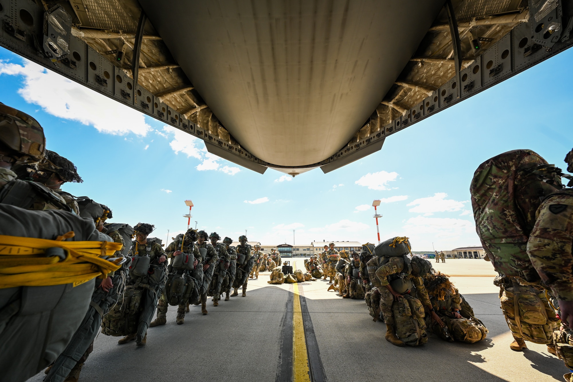 U.S. Army paratroopers from the 173rd Airborne Brigade board a C-17 Globemaster III during Swift Response 25 on the flightline at Spangdahlem Air Base, Germany, May 16, 2025.