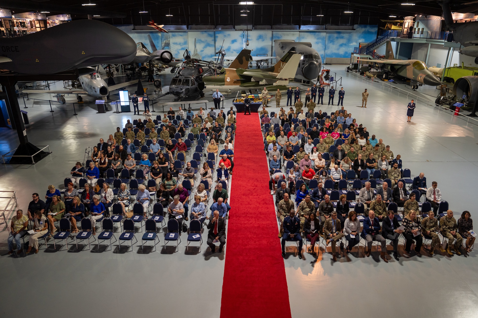 A top shot of a group of people sitting down