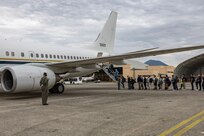 Staff members from Commander, U.S. 6th Fleet board a C-40 Clipper aircraft on board Naval Support Activity Naples, Italy in preparation for a flight to Naval Station Rota, Spain May 15.