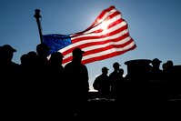 The crew of U.S. Coast Guard Cutter Cypress (WLB-210) conducts a burial at sea for the cremated remains of Robert Pelley in the Gulf of Alaska near Kodiak, Alaska, Nov. 3, 2024. Pelley was a seaman apprentice at the Deck Force Unit stationed in Oregon from 1984 to 1985. (U.S. Coast Guard video by Petty Officer 3rd Class Cameron Snell)
