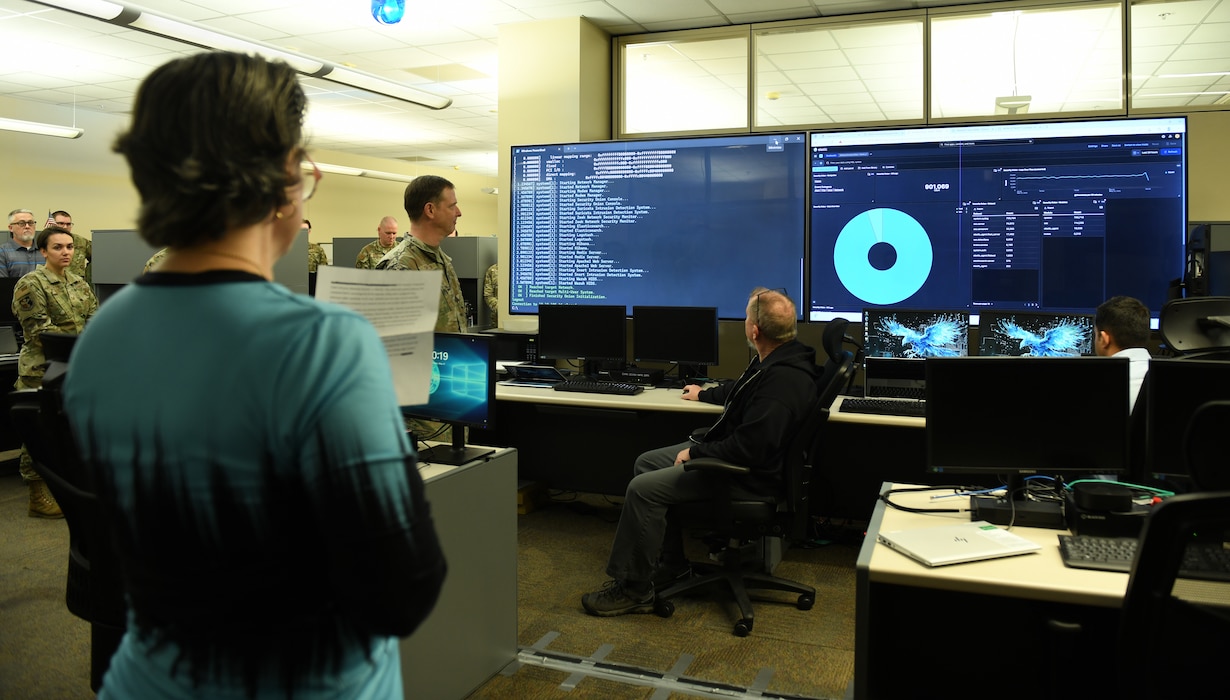 An Air Force civilian giving a speech