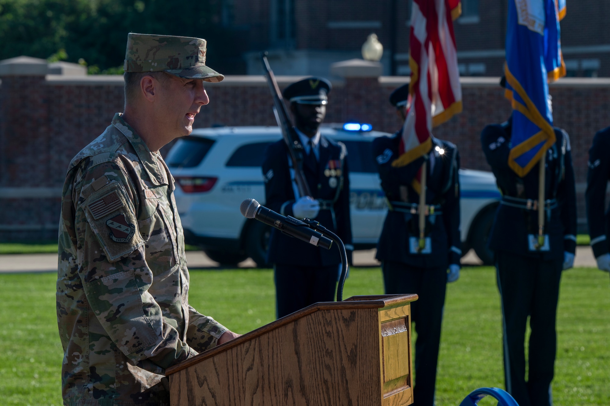 U.S. Air Force Col. Ryan A. F. Crowley, commander of JBAB and the 11th Wing, delivers remarks during the opening ceremony of National Police Week on Joint Base Anacostia-Bolling, Washington, D.C., May 12, 2025. Crowley praised the 11th Security Forces Squadron for their year-round service while noting their responsibility for safeguarding more than 18,000 people and $4.5 billion in assets. (U.S. Air Force photo by Hayden Hallman)