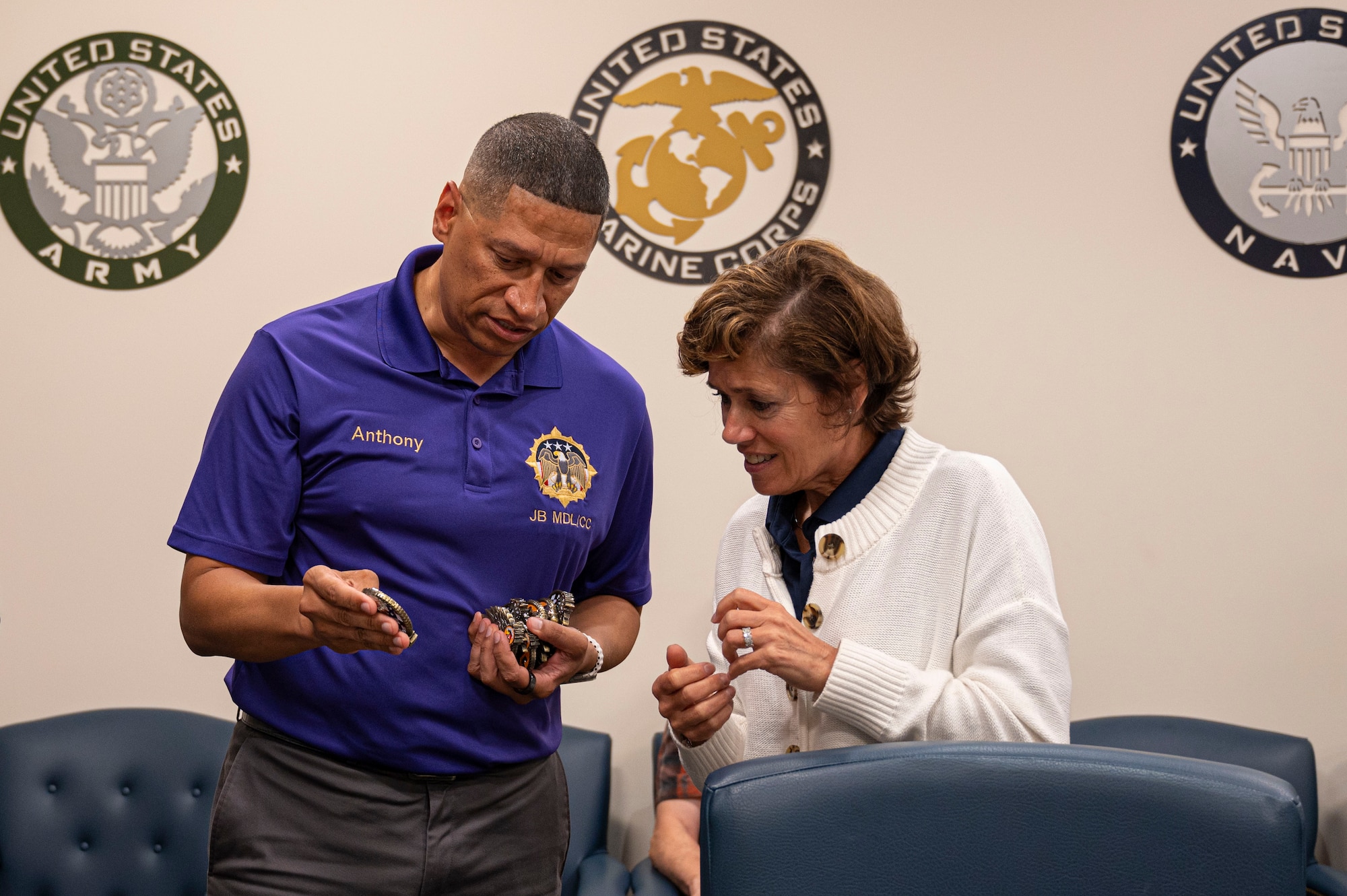 Retired Air Force Lt. Gen. Gina Grosso, prior Joint Base McGuire-Dix-Lakehurst commander, is coined by U.S. Air Force Col. Anthony Smith, JB MDL and 87th Air Base Wing commander.