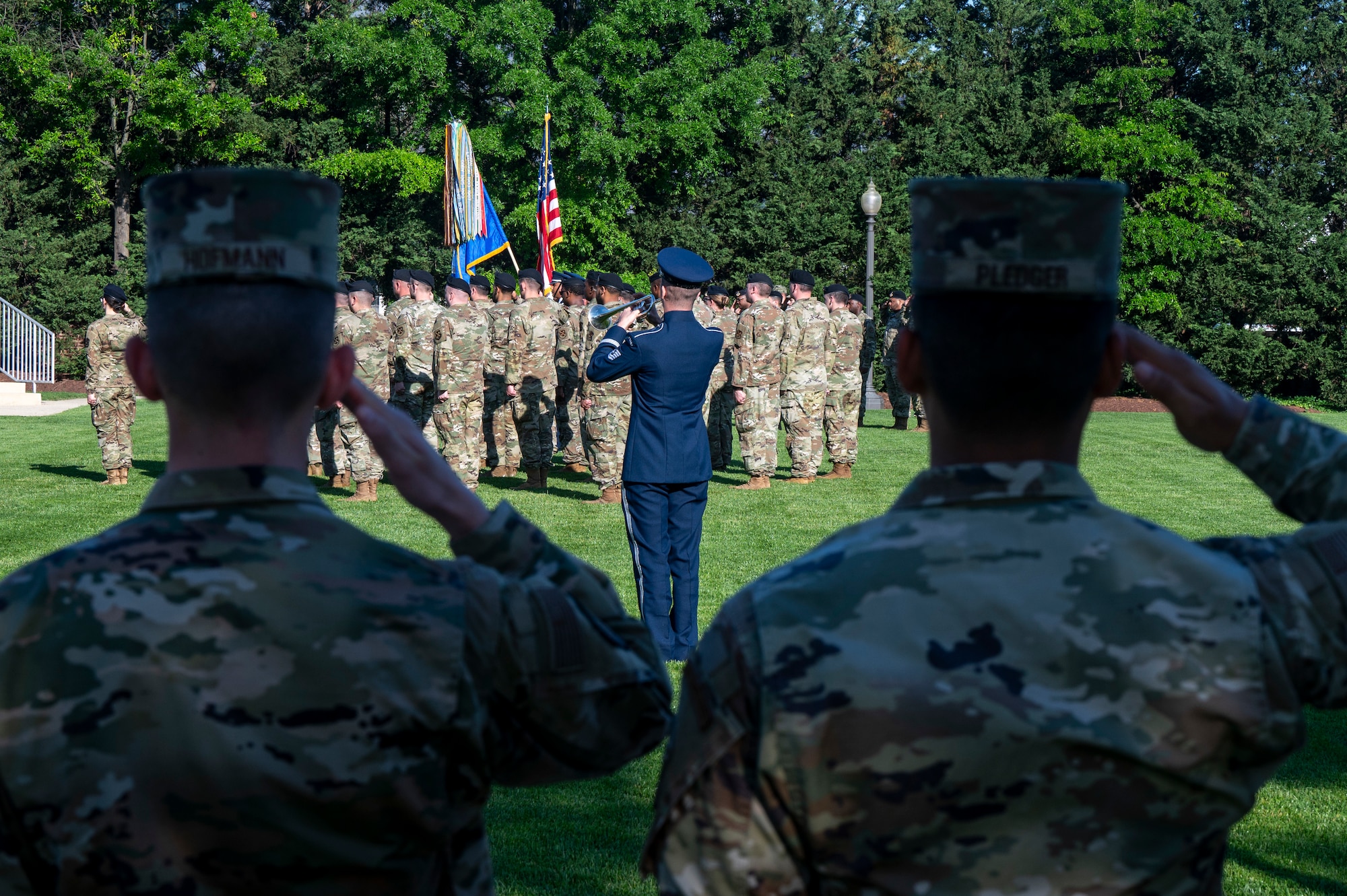 U.S. Air Force Tech. Sgt. Bradley Jones, a member of The U.S. Air Force Band, plays taps during the opening ceremony of National Police Week on Joint Base Anacostia-Bolling, Washington, D.C., May 12, 2025. The playing of taps immediately followed the reading of the names of U.S. Air Force and Navy security forces and Metropolitan Police Department members who made the ultimate sacrifice in the line of duty since the year 2000. (U.S. Air Force photo by Hayden Hallman)