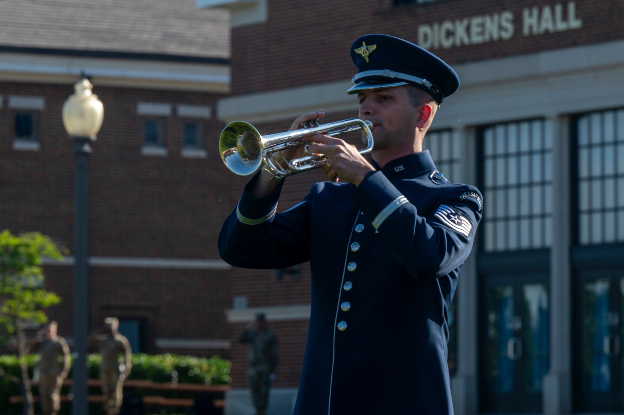 U.S. Air Force Tech. Sgt. Bradley Jones, a member of The U.S. Air Force Band, plays taps during the opening ceremony of National Police Week on Joint Base Anacostia-Bolling, Washington, D.C., May 12, 2025. The playing of taps immediately followed the reading of the names of U.S. Air Force and Navy security forces and Metropolitan Police Department members who made the ultimate sacrifice in the line of duty since the year 2000. (U.S. Air Force photo by Hayden Hallman)