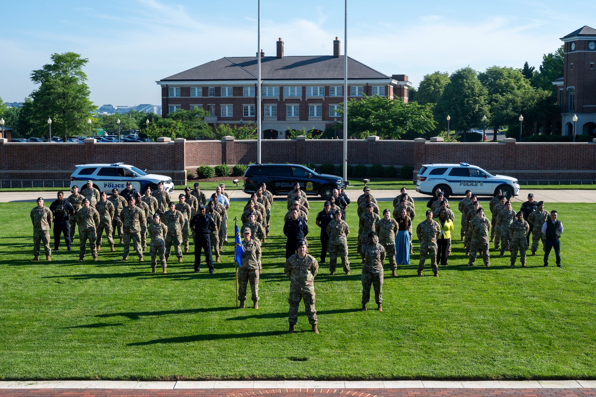 The 11th Security Forces Squadron gathers for a photo on Joint Base Anacostia-Bolling, Washington, D.C., May 12, 2025. JBAB defenders are charged with delivering airbase ground defense and law enforcement to the 11th Wing, its 74 mission partners and the JBAB community. (U.S. Air Force photo by Hayden Hallman)