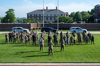 The 11th Security Forces Squadron gathers for a photo on Joint Base Anacostia-Bolling, Washington, D.C., May 12, 2025. JBAB defenders are charged with delivering airbase ground defense and law enforcement to the 11th Wing, its 74 mission partners and the JBAB community. (U.S. Air Force photo by Hayden Hallman)