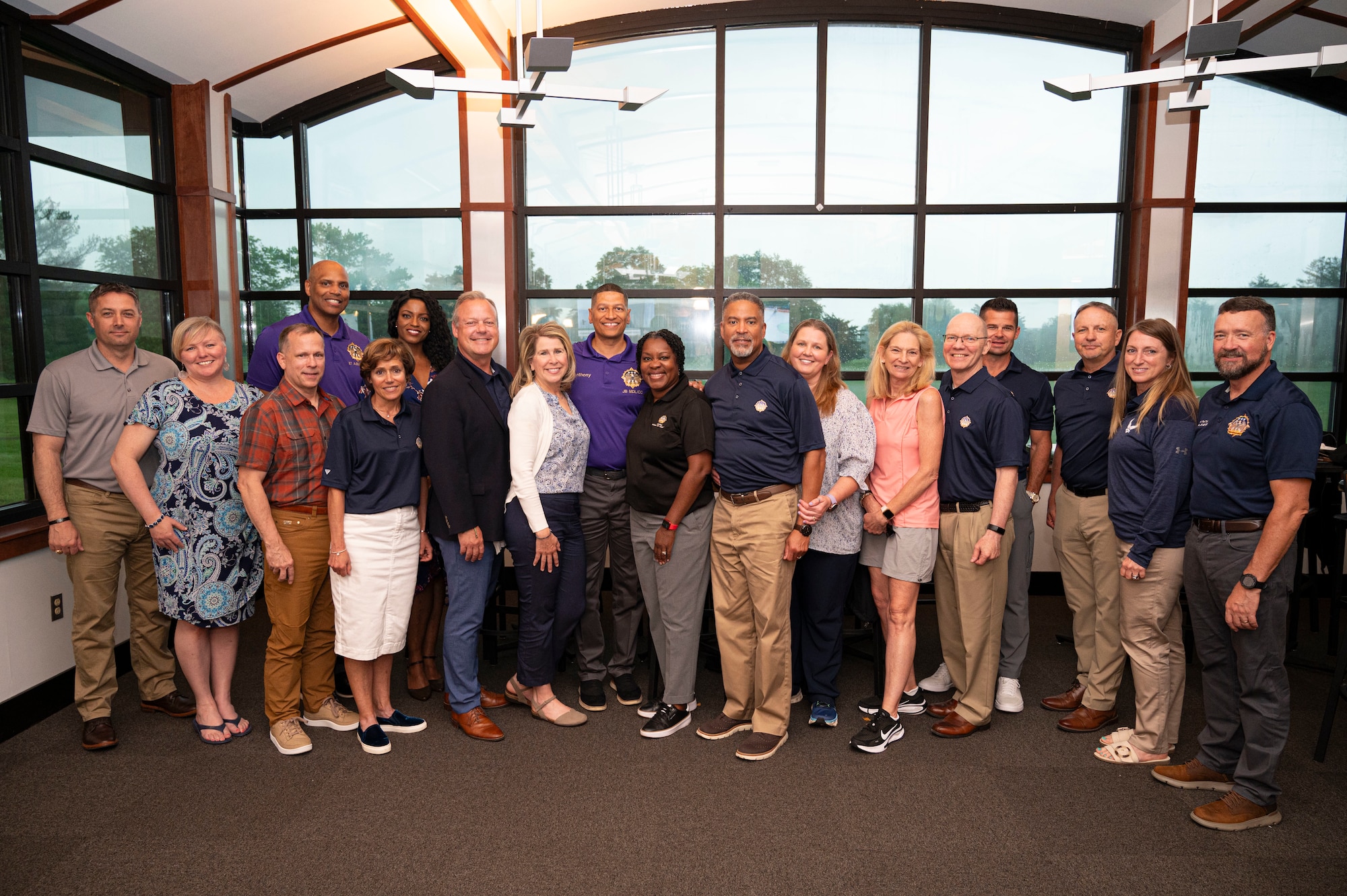 U.S. Air Force Col. Anthony Smith, Joint Base McGuire-Dix-Lakehurst and 87th Air Base Wing commander, and U.S. Air Force Chief Master Sgt. Michael Wynne, 87th ABW command chief, pose for a photo with prior JB MDL leaders and their spouses during the inaugural Prior Leaders Summit.
