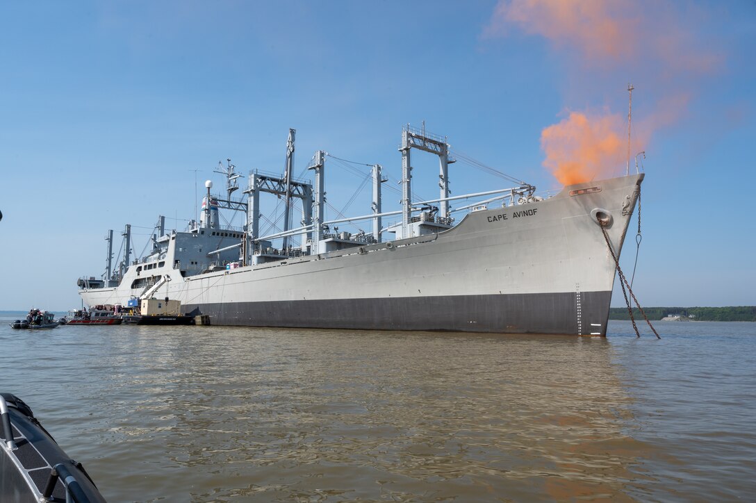 A smoking ship sails on the river. (U.S. Air Force photo by Airman 1st Class Donnell Ramsey)