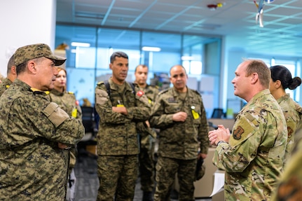 Col. Boone Caldon, commander of the 153rd Medical Group, briefs Tunisian armed forces of medical capabilities during a Tunisian NCO development presentation at Cheyenne, Wyoming, on May 12, 2025.