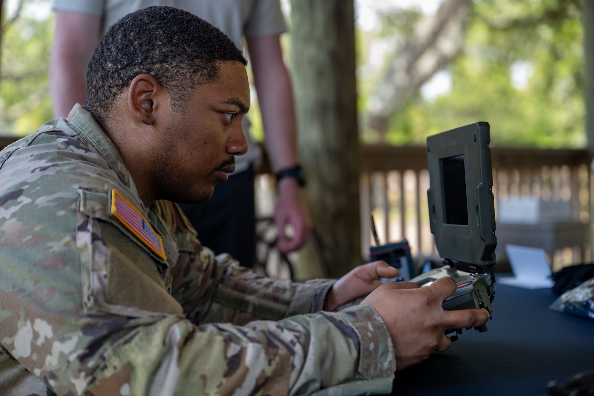 U.S. Army Spc. Calvin Martin assigned to the 52nd Ordnance Group operates a QinetiQ remote-robot controller during United States Bomb Technician Association Week