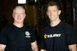U.S. Army Col. Eddie Simpson (left) and 1st Lt. Erik Thomas pose for a post-workout photo at CrossFit Frankfort in Frankfort, Kentucky, May 15, 2025.