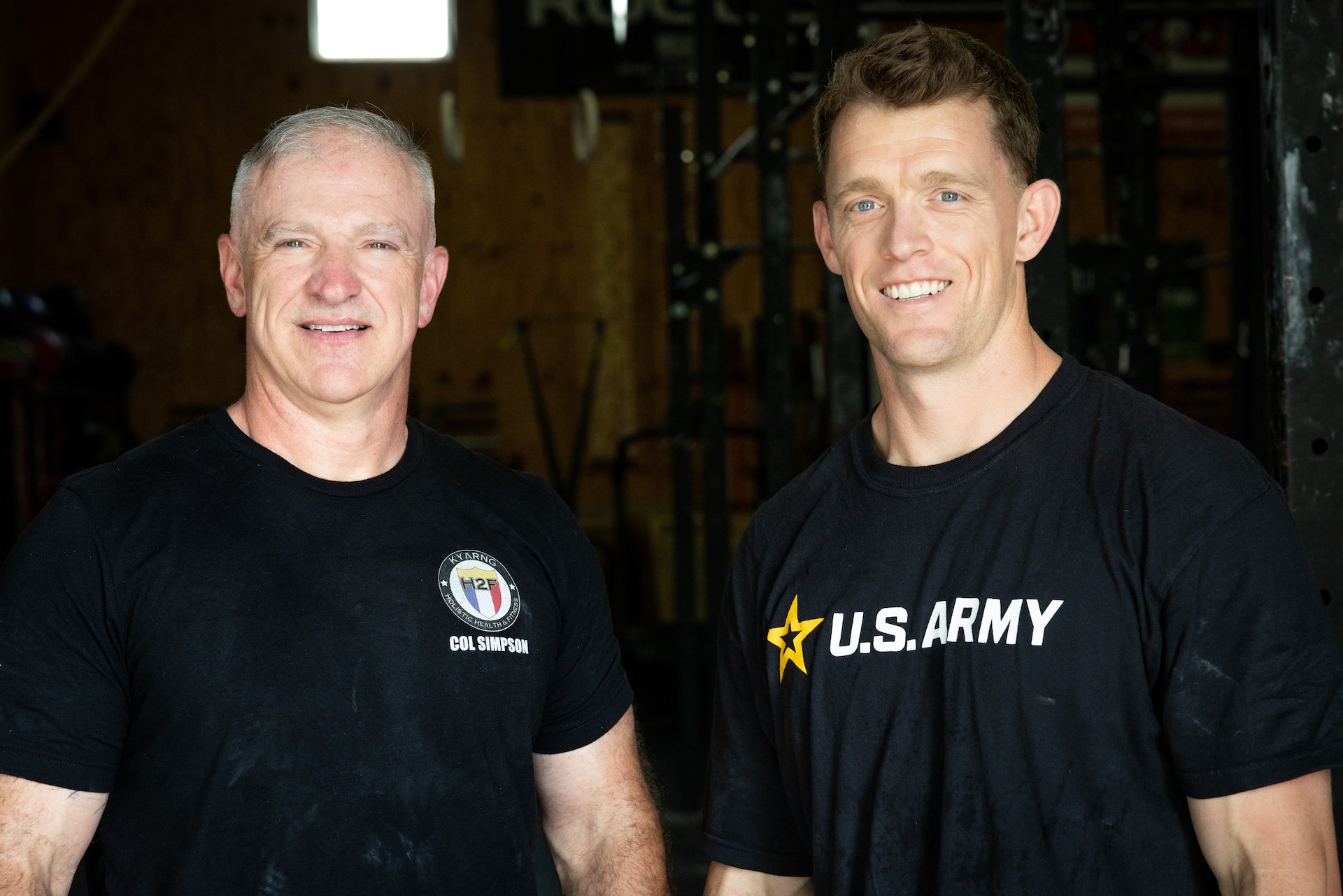 U.S. Army Col. Eddie Simpson (left) and 1st Lt. Erik Thomas pose for a post-workout photo at CrossFit Frankfort in Frankfort, Kentucky, May 15, 2025.
