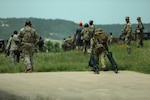 Staff Sgt. Ashley Renye perform during a culminating training event to medically evacuate soldiers at Fort Cavazos, Texas, May 14, 2025. This training scenario had units from the 3-238th General Support Aviation Battalion (Michigan), the 101st Public Affairs Detachment (Delaware) and the 328th Military Police Platoon (New Jersey) work together to respond to a vehicle rollover accident with multiple casualties.