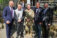 U.S. Army Maj. Aaron Gaber, center, a Jewish chaplain with the 56th Stryker Brigade Combat Team, 28th Infantry Division, Pennsylvania National Guard in support of the Joint Multinational Training Group-Ukraine mission and a guest of honor, stands with distinguished guests at a commemoration ceremony, Straubing, Germany, May 18, 2025. The ceremony commemorated the 80th anniversary of a post-World War II Jewish service at the Straubing synagogue for nearly 700 displaced persons. The 1945 Jewish service was led a U.S. Army rabbi chaplain. (Courtesy Photo)
