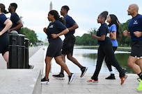 Members of the 113th Force Support Squadron, D.C. Air National Guard, participate in an initiative called 'Run to Recruit' on the National Mall, in Washington, D.C., on March 17, 2025. In an effort to support recruiting mission, members of the 113th FSS use group physical fitness as a method to inspire, engage and recruit future Capital Guardians.