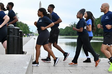 Members of the 113th Force Support Squadron, D.C. Air National Guard, participate in an initiative called 'Run to Recruit' on the National Mall, in Washington, D.C., on March 17, 2025. In an effort to support recruiting mission, members of the 113th FSS use group physical fitness as a method to inspire, engage and recruit future Capital Guardians.