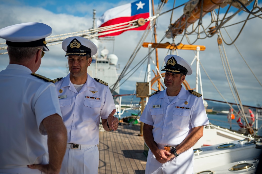 Adm. Samuel Paparo, commander of U.S. Indo-Pacific Command is greeted by Capt. Andres Gallegos,commanding officer, Chilean Navy tall ship Esmeralda, during his visit to the ship at Joint Base Pearl Harbor Hickam, May 20, 2025.