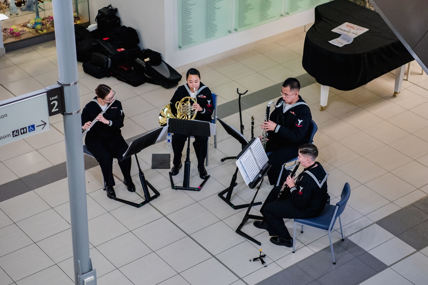 WELLINGTON, New Zealand (May 19, 2025) Sailors assigned to the U.S. 7th Fleet Band embarked aboard the U.S. 7th Fleet flagship, USS Blue Ridge (LCC 19), perform at the local Wellington Hospital during a scheduled port visit in Wellington, New Zealand, May 20, 2025. U.S. 7th Fleet is the U.S. Navy's largest forward-deployed numbered fleet, and routinely interacts and operates with allies and partners in preserving a free and open Indo-Pacific region. (U.S. Navy Photo by Musician 3rd Class Christiena Taralson)