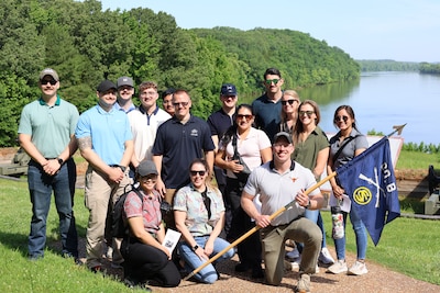 Officer Candidates from OCS Class 70-25 with the Illinois Army National Guard pose for a group photo overlooking the Cumberland River at Fort Donelson National Battlefield in Dover, Tennessee, May 16, 2025.
