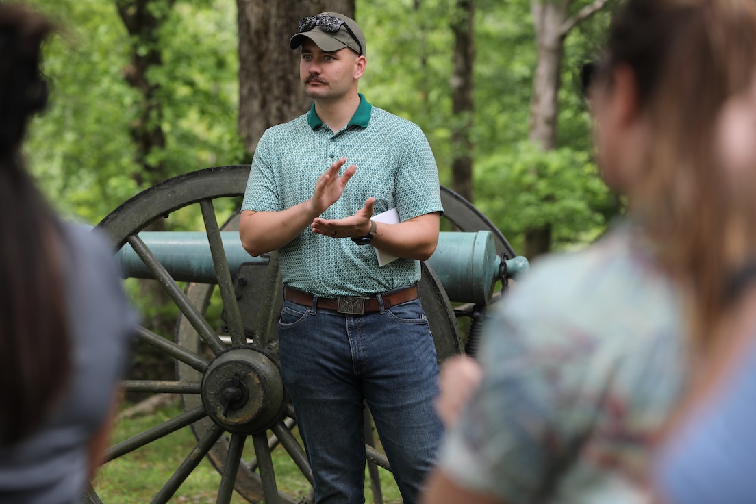 Officer Candidate John Winkler applauds fellow officer candidates during a stop at Fort Donelson National Battlefield as part of the Illinois Army National Guard OCS staff ride, which connects historical military leadership with modern officer development.