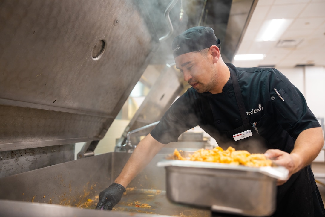 Luis Murrieta, a chief cook with Marine Corps Air Station Miramar, participates in the Culinary Team of the Quarter competition at the 31 Area Mess Hall on Marine Corps Base Camp Pendleton, Calif., May 7, 2025. The two-day event included a knowledge-based elimination round followed by a live cooking challenge using a mystery basket of ingredients. The competition aims to enhance MOS proficiency, foster teamwork, and recognize excellence among food service professionals across Marine Corps Installations West. (U.S. Marine Corps photo by Sgt. Patrick King)