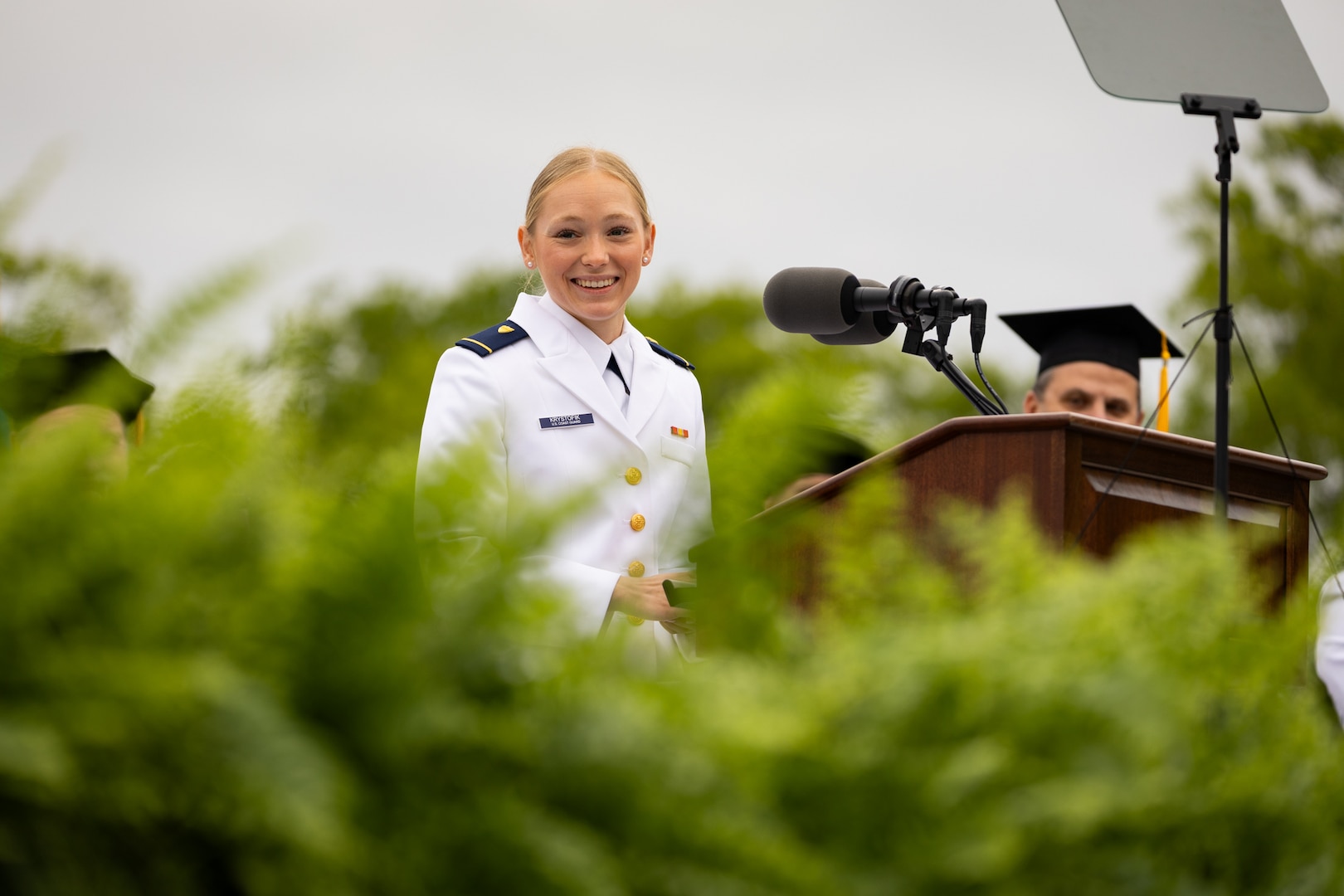 U.S. Coast Guard Academy (USCGA) Cadet First Class Veronica Lynn Krystofik gives a speech during the 144th Commencement Exercises. Krystofik was this year’s Distinguished Graduate, which ranks cadets based on their academic grade point average, military readiness, and athletic performance. (U.S. Coast Guard courtesy photo.)