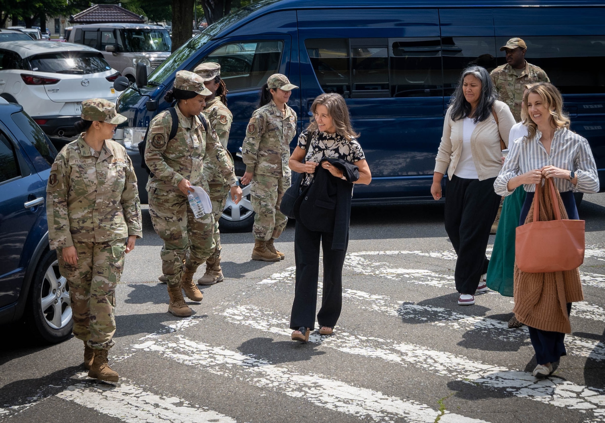 Ms. Lori is greeted by Airman