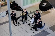WELLINGTON, New Zealand (May 19, 2025) Sailors assigned to the U.S. 7th Fleet Band embarked aboard the U.S. 7th Fleet flagship, USS Blue Ridge (LCC 19), perform at the local Wellington Hospital during a scheduled port visit in Wellington, New Zealand, May 20, 2025. U.S. 7th Fleet is the U.S. Navy's largest forward-deployed numbered fleet, and routinely interacts and operates with allies and partners in preserving a free and open Indo-Pacific region. (U.S. Navy Photo by Musician 3rd Class Christiena Taralson)