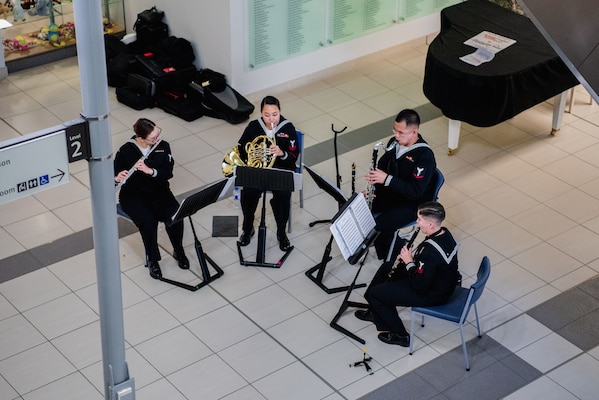 WELLINGTON, New Zealand (May 19, 2025) Sailors assigned to the U.S. 7th Fleet Band embarked aboard the U.S. 7th Fleet flagship, USS Blue Ridge (LCC 19), perform at the local Wellington Hospital during a scheduled port visit in Wellington, New Zealand, May 20, 2025. U.S. 7th Fleet is the U.S. Navy's largest forward-deployed numbered fleet, and routinely interacts and operates with allies and partners in preserving a free and open Indo-Pacific region. (U.S. Navy Photo by Musician 3rd Class Christiena Taralson)