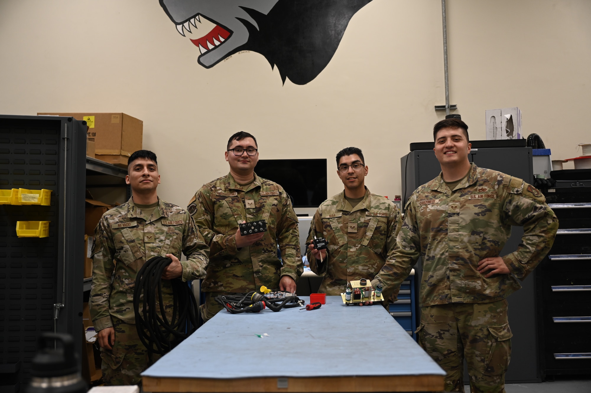 From left to right: U.S. Air Force Senior Airman Ernesto Nevado, 8th Maintenance Squadron AFREP technician, Senior Airmen Michael Philip Flores Rodriguez, 8th Maintenance Squadron AFREP technician, Staff Sgt. Edgar Nava, 8th Maintenance Squadron AFREP technician and Staff Sgt. Anthony Canzoneri, 8th Maintenance Squadron AFREP non-commissioned officer in charge, pose for a photo at Kunsan Air Base, Republic of Korea, May 21, 2025. The strategic approach of the AFREP program allows maintainers to repair rather than replace equipment, a valuable resource that extends beyond the maintenance group and keeps essential components readily available without relying on external repair locations.