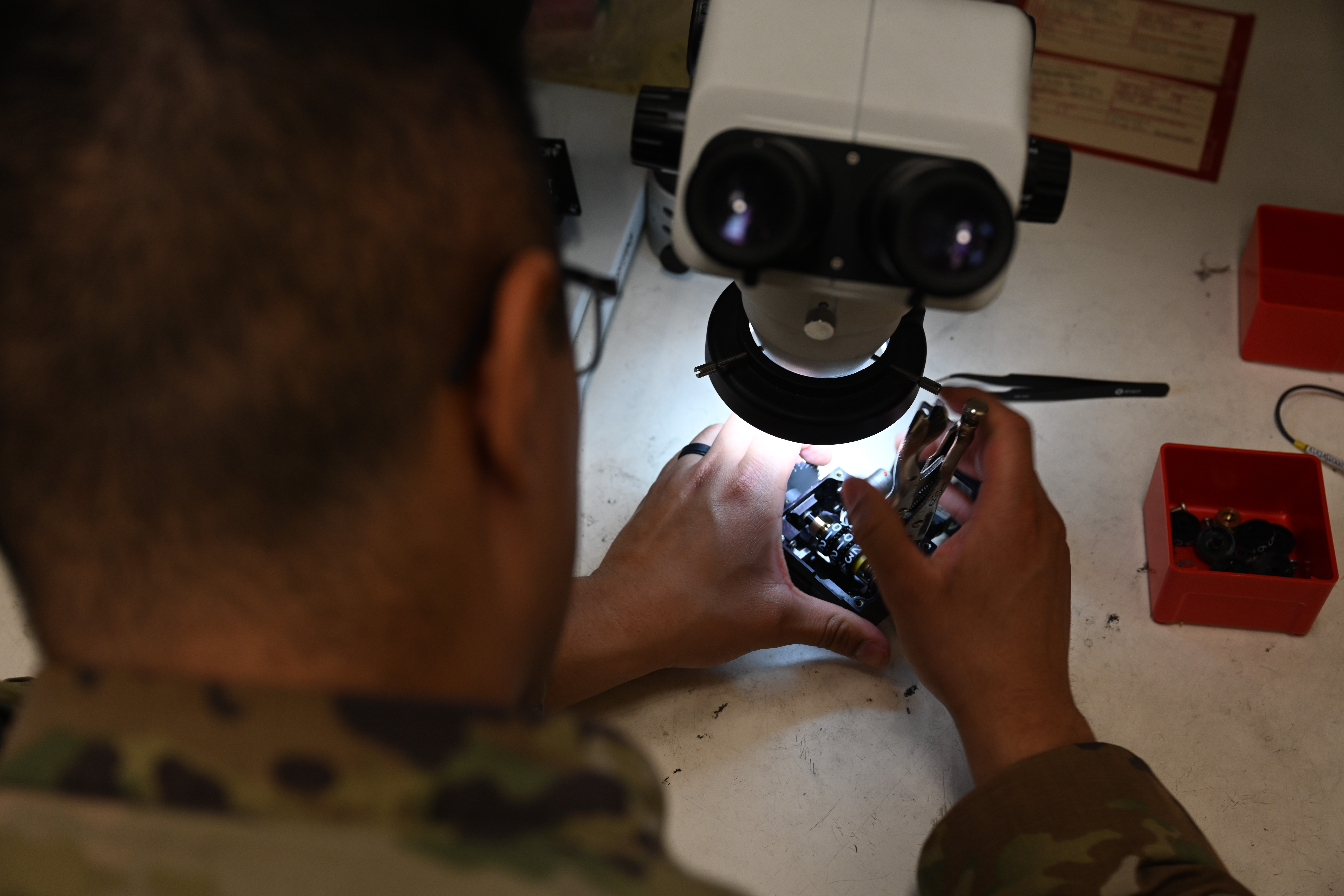 U.S. Air Force Staff Sgt. Edgar Nava, 8th Maintenance Squadron AFREP technician, repairs a rounds counter for the U.S. Air Force f-16 Fighting Falcon armament system at Kunsan Air Base, Republic of Korea, May 25, 2025. The strategic approach within the AFREP program allows for maintainers to repair rather than replace equipment, a valuable resource that keeps essential components readily available without relying on external repair locations. (U.S. Air Force photo by Tech. Sgt. Giovanni Sims)