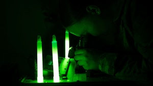 U.S. Air Force Senior Airman Meadow Brown, 51st Operations Support Squadron aircrew flight equipment technician, inspects night vision goggles at Osan Air Base, Republic of Korea, May 22, 2025. NVGs are checked every 180 days to ensure functionality for low-light missions and emergency scenarios such as ejection or recovery in unfamiliar terrain. (U.S. Air Force photo by Senior Airman Rome Bowermaster)