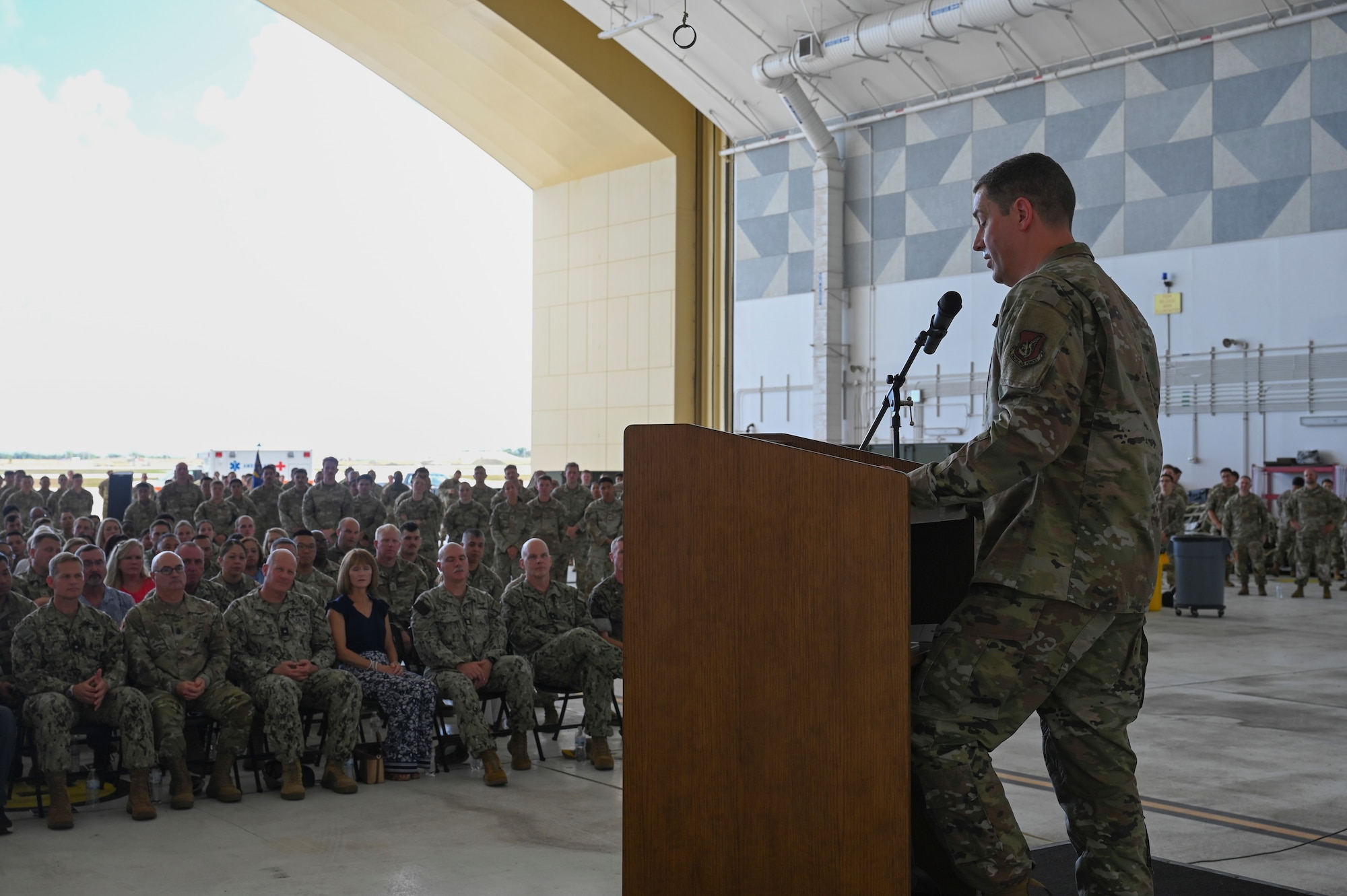 U.S. Air Force Col. Charles Cooley delivers his first speech as the 36th Wing commander at Andersen Air Force Base, Guam, May 22, 2025. Cooley previously presided as the deputy commander for the 618th Air Operations Center at Scott Air Force Base, Illinois.
(U.S. Air Force photo by Airman 1st Class Joseph Maye)